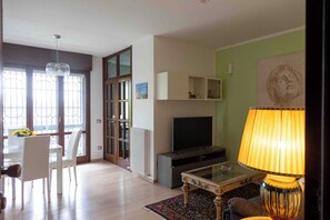 Apartment | Living area | 30-inch flat-screen TV with digital channels