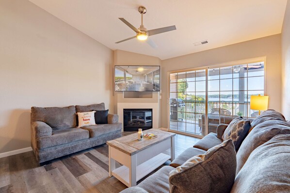 Condo, Multiple Beds, Balcony (Highland Shores Haven) | Living area | 42-inch flat-screen TV with digital channels, fireplace