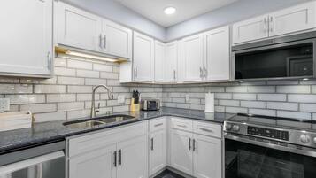 House, Multiple Beds, Patio (Lakation at the Water) | Private kitchen | Fridge, microwave, oven, stovetop