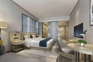 A modern hotel room with a large bed, a desk, and a TV. - Keli Select Zero Pressure Sleep Hotel (Zhijiang Sports Center) (Zhijiang)