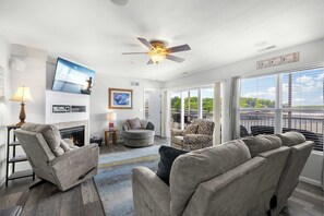 Condo, Multiple Beds, Balcony (Seascape Cove) | Living area | 42-inch flat-screen TV with digital channels, fireplace