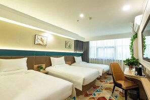 A hotel room with two beds, a desk, a chair, and a window with curtains. - ning zhao Hotel (Shijiazhuang Railway University Subway Station) (Shijiazhuang)