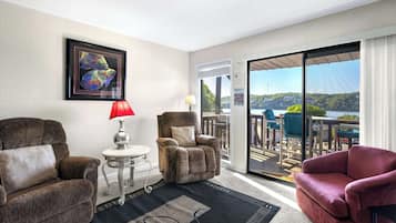 Condo, 1 King Bed with Sofa bed, Balcony (The Nook at Weston Point) | Living area | 41-inch flat-screen TV with digital channels