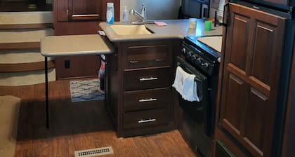 Cozy RV at Blue Springs Landing with all the comforts of home.
