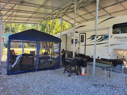 Cozy RV at Blue Springs Landing with all the comforts of home.