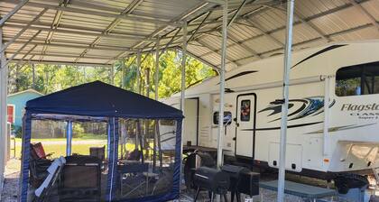 Cozy RV at Blue Springs Landing with all the comforts of home.
