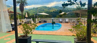 Pousada Encantos da Serra Macacos