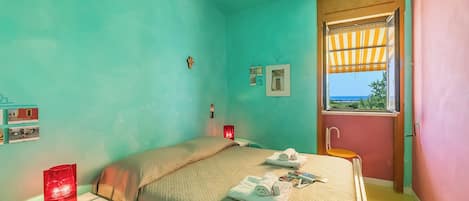 Family Apartment, Multiple Bedrooms (Tramonto Salentino Apartment Sea View) | 2 bedrooms, bed sheets