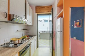 อพาร์ทเมนท์สำหรับครอบครัว, หลายห้องนอน (Tramonto Salentino Apartment Sea View) | ครัวส่วนตัว | ตู้เย็น, เตาประกอบอาหาร, เครื่องชงกาแฟ/ชา, เครื่องครัว/จาน/ช้อนส้อม