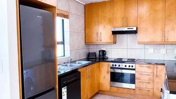 Apartment, 1 Double Bed with Sofa bed, Patio, Mountain View (210 Atlantica ) | Private kitchen | Fridge, microwave, oven, stovetop