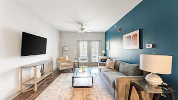 Apartment, 2 Bedrooms (QueenBed) | Living area | 50-inch TV with digital channels
