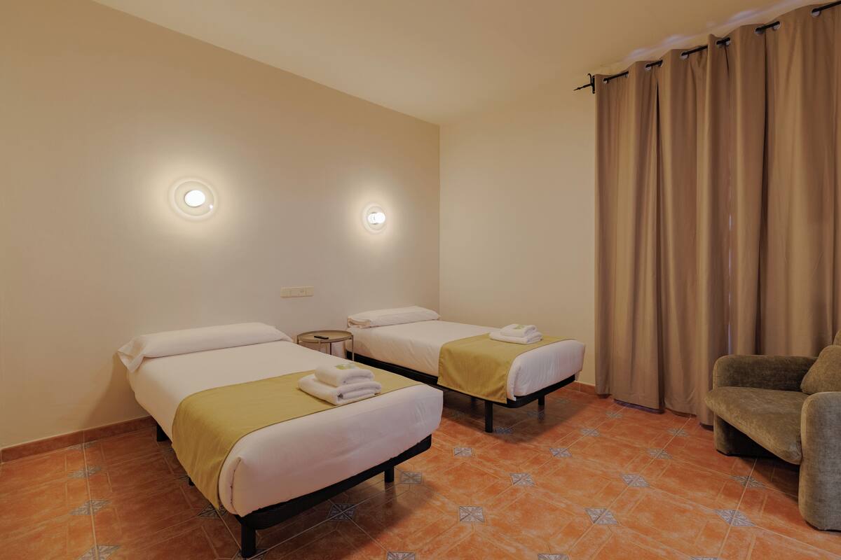 Twin Room | Memory-foam beds, in-room safe, blackout curtains