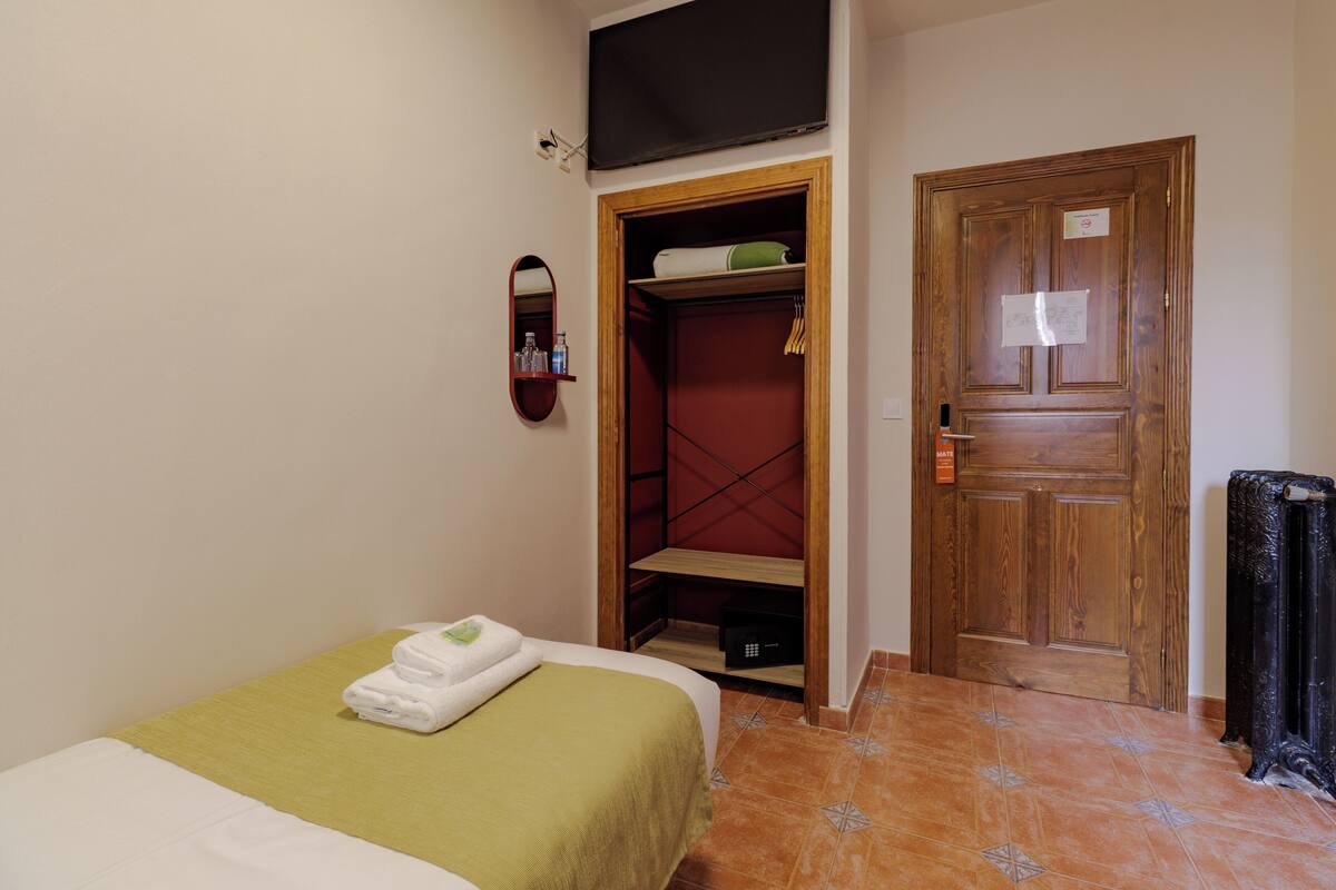 Single Room | Memory-foam beds, in-room safe, blackout curtains
