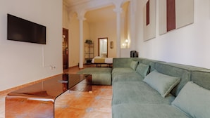 Suite, Balcony, City View | Living area | 43-inch Smart TV with satellite channels - Hotel Ávila Centro (Ávila)