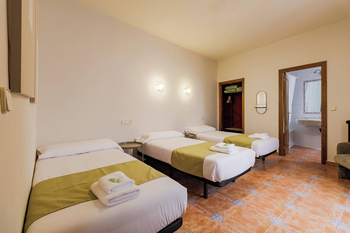 Triple Room | Memory-foam beds, in-room safe, blackout curtains