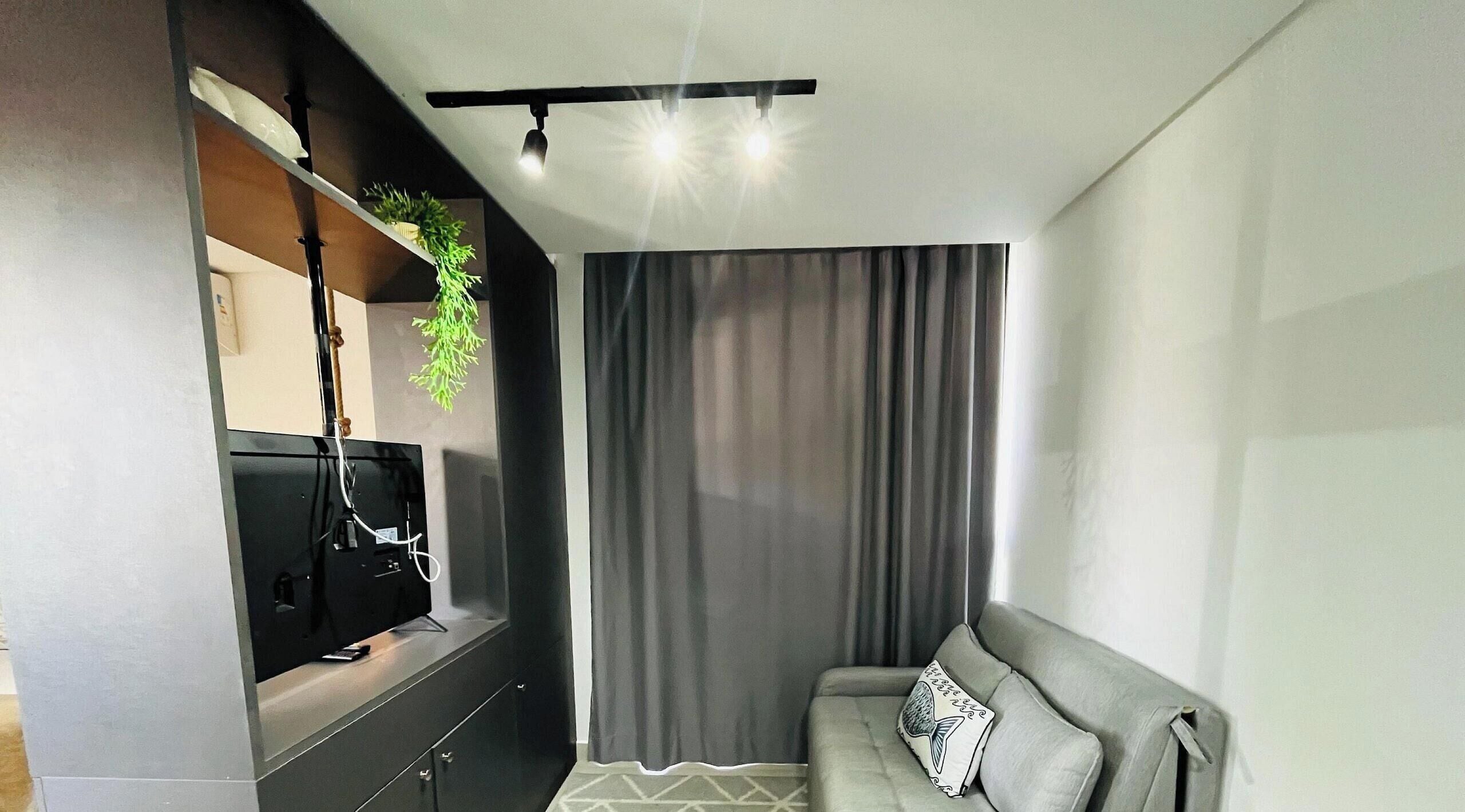 Deluxe-Dreibettzimmer | Wohnbereich