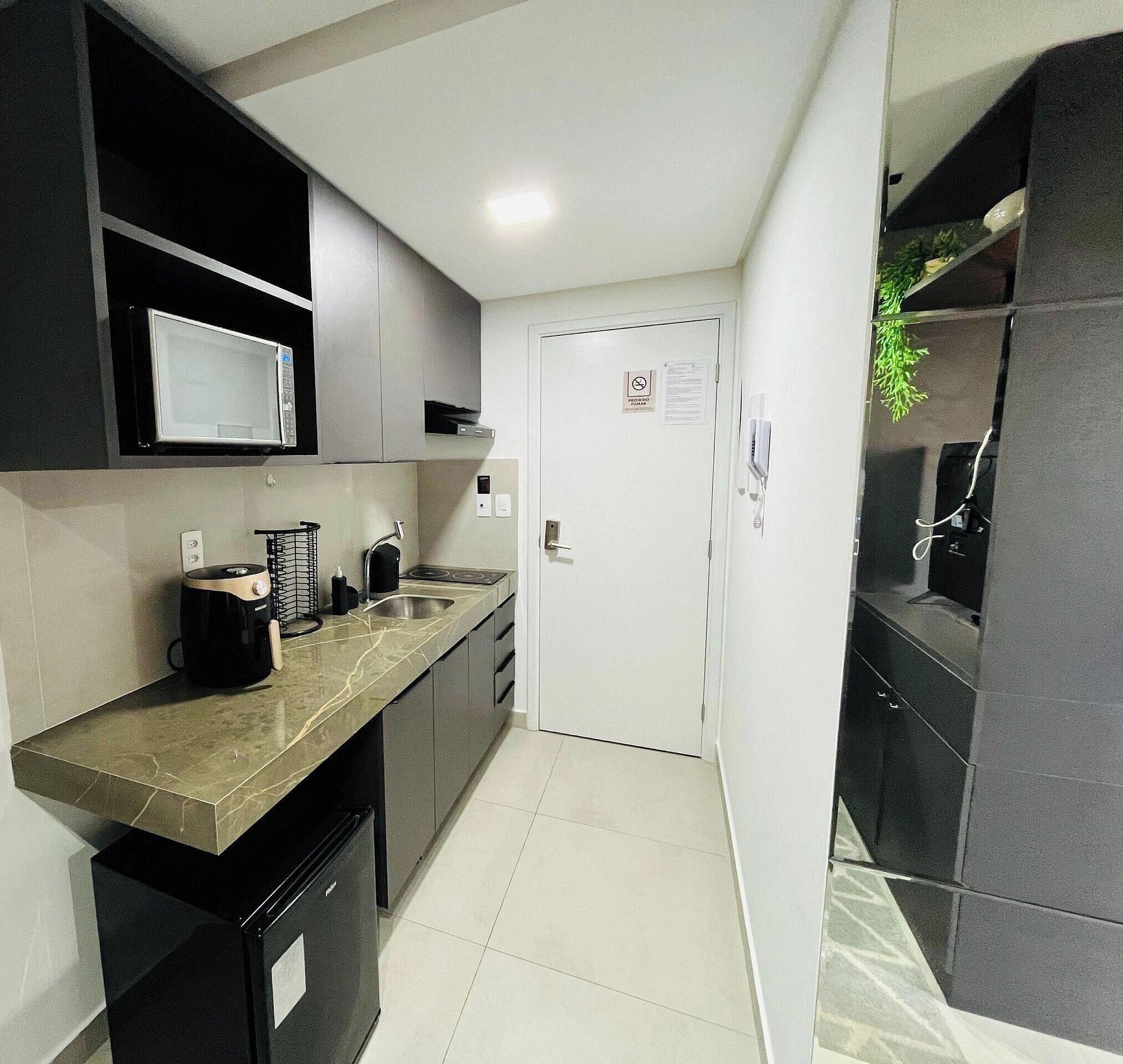 Deluxe Triple Room | Private kitchen