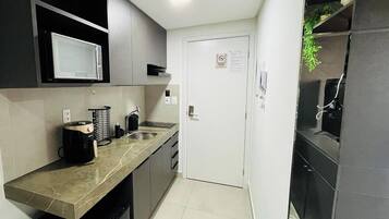 Deluxe Triple Room | Private kitchen