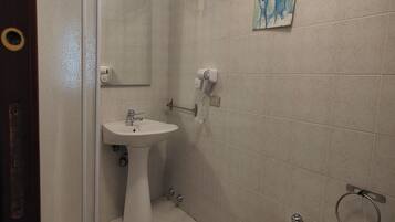 Superior Apartment, Balcony | Bathroom | Hair dryer, towels, soap, shampoo
