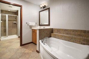Jetted tub, hair dryer, towels, soap