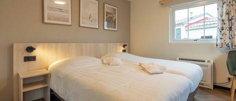 1 habitación, acceso a internet y ropa de cama