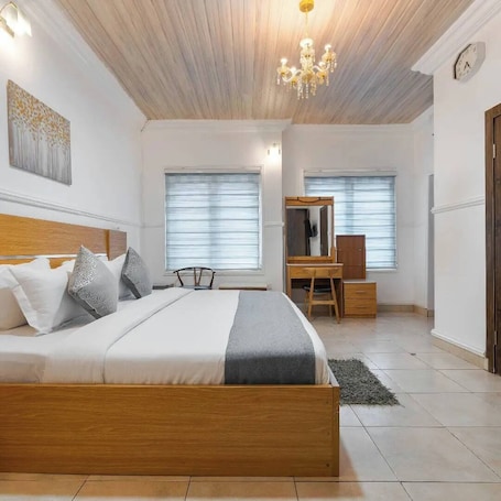 Deluxe Apartment, Balcony, City View | 1 bedroom, desk, laptop workspace, blackout drapes