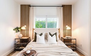 Casa Deluxe, varias habitaciones, vista al jardín | 8 habitaciones y camas con efecto memoria 