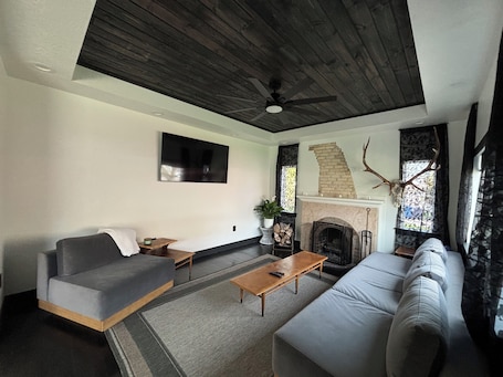 TV, fireplace. Welcome to the Raven Rose - A Chic, Newly Renovated 2BD/1BA Home