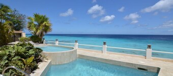 Bellevue Penthouse! Oceanfront w/ RARE sandy beach & pool.