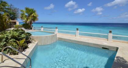 Bellevue Penthouse! Oceanfront w/ RARE sandy beach & pool.