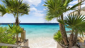 On the beach, sun loungers, beach towels