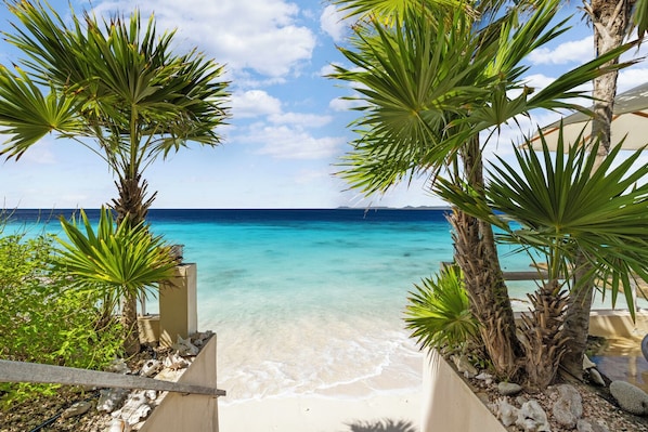 On the beach, sun loungers, beach towels