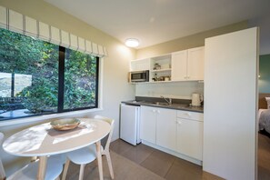 Fridge, microwave, toaster, cookware/dishes/utensils