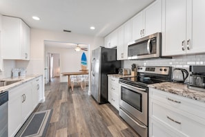 House (3 Bedrooms) | Private kitchen | Fridge, microwave, oven, stovetop - 311 Jack Dr (Cocoa Beach)