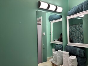 Hair dryer, towels, soap, shampoo