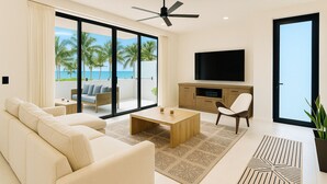 A modern living room with a sofa, coffee table, and TV, large sliding glass doors to a balcony with a view of palm trees and the sea.