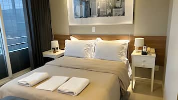 Apartamento | Roupas de cama premium, edredons de pluma, Wi-Fi de cortesia