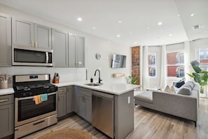 Private kitchen - Charming Row Home Apt in West Philly Your Getaway! (Philadelphia)