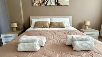 2 habitaciones, tabla de planchar con plancha, wifi y ropa de cama