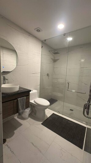 Shower, hair dryer, towels, soap