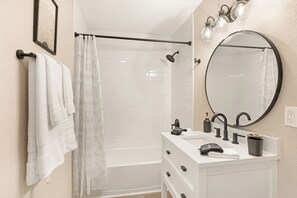Hair dryer, towels, soap, toilet paper