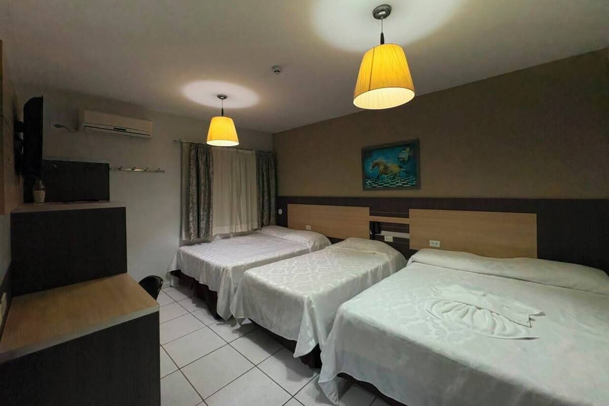 Family Room | Minibar, desk, laptop workspace, blackout curtains