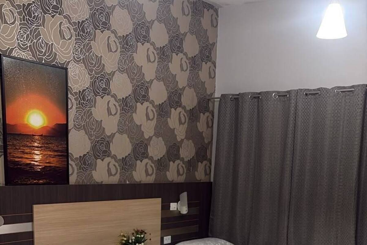Senior Triple Room | Minibar, desk, laptop workspace, blackout curtains