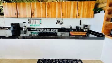 Fridge, stovetop, coffee/tea maker, electric kettle