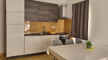 Apartment (Two-Bedroom Apartment With Terrace An) | Private kitchen | Fridge