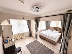 Familienzimmer, eingeschränkter Meerblick | Wohnbereich