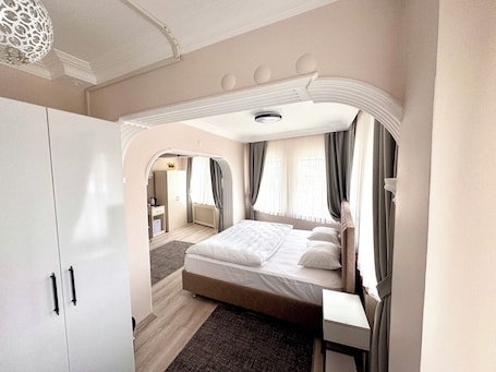 Family Room, Partial Sea View | Laptop workspace, free WiFi