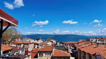 Deluxe Suite, Balcony, Sea View | Terrace/patio