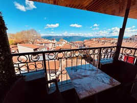Deluxe Suite, Balcony, Sea View | Terrace/patio