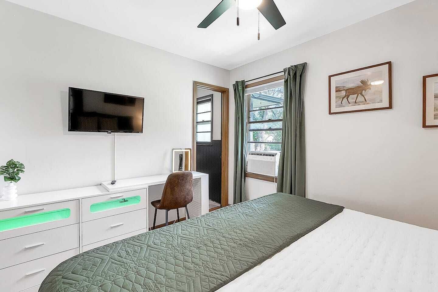 1 bedroom, desk, iron/ironing board, travel crib